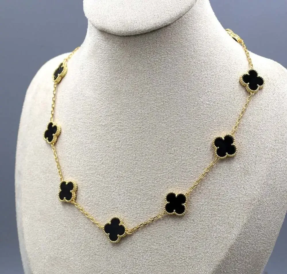 10 clover necklace black and gold